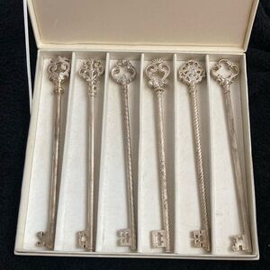 Neiman Marcus silver plated skeleton key drink stirrers (6)